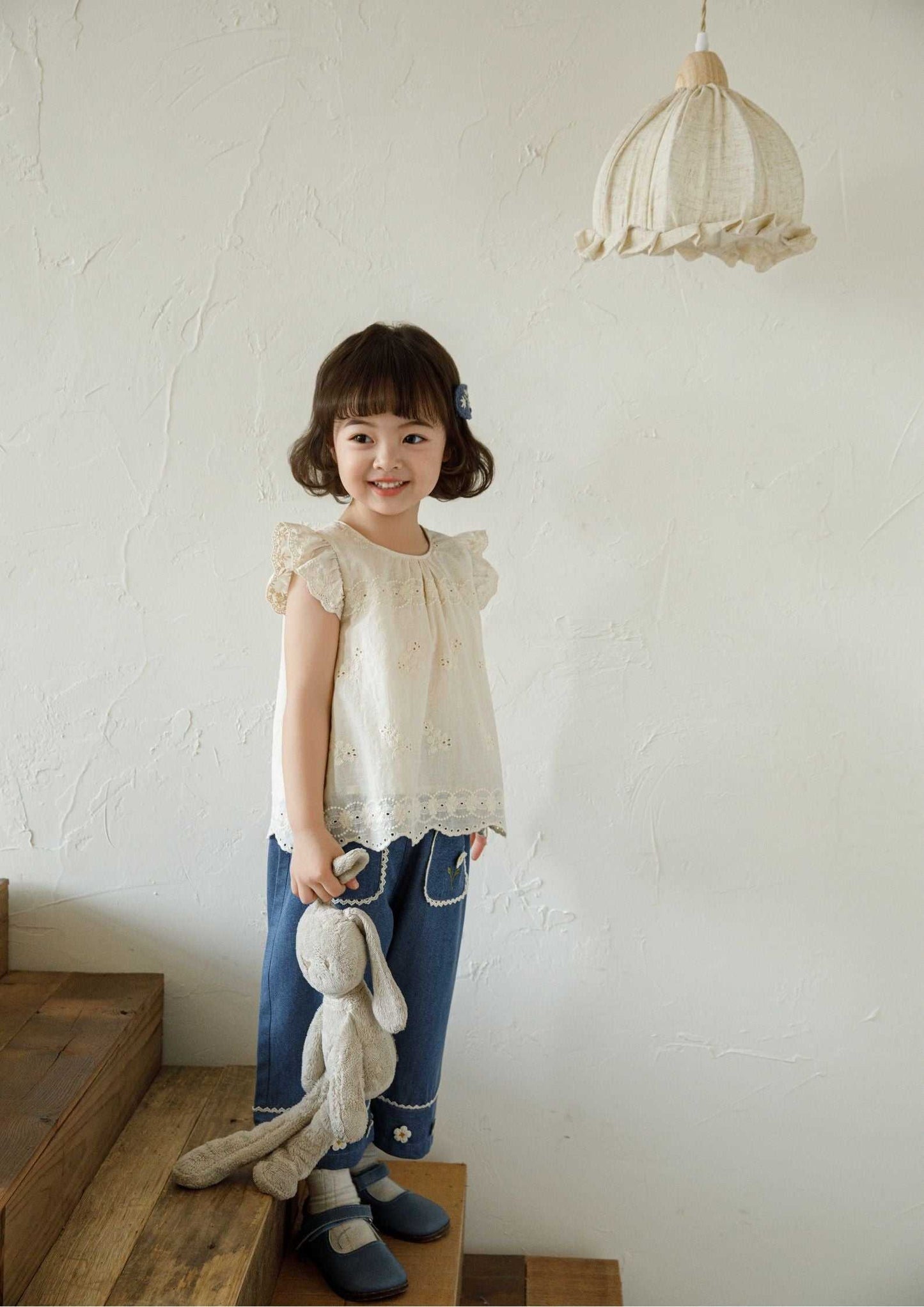 Girls embroidered cotton sleeveless beige floral blouse with ruffle sleeves and scalloped hem