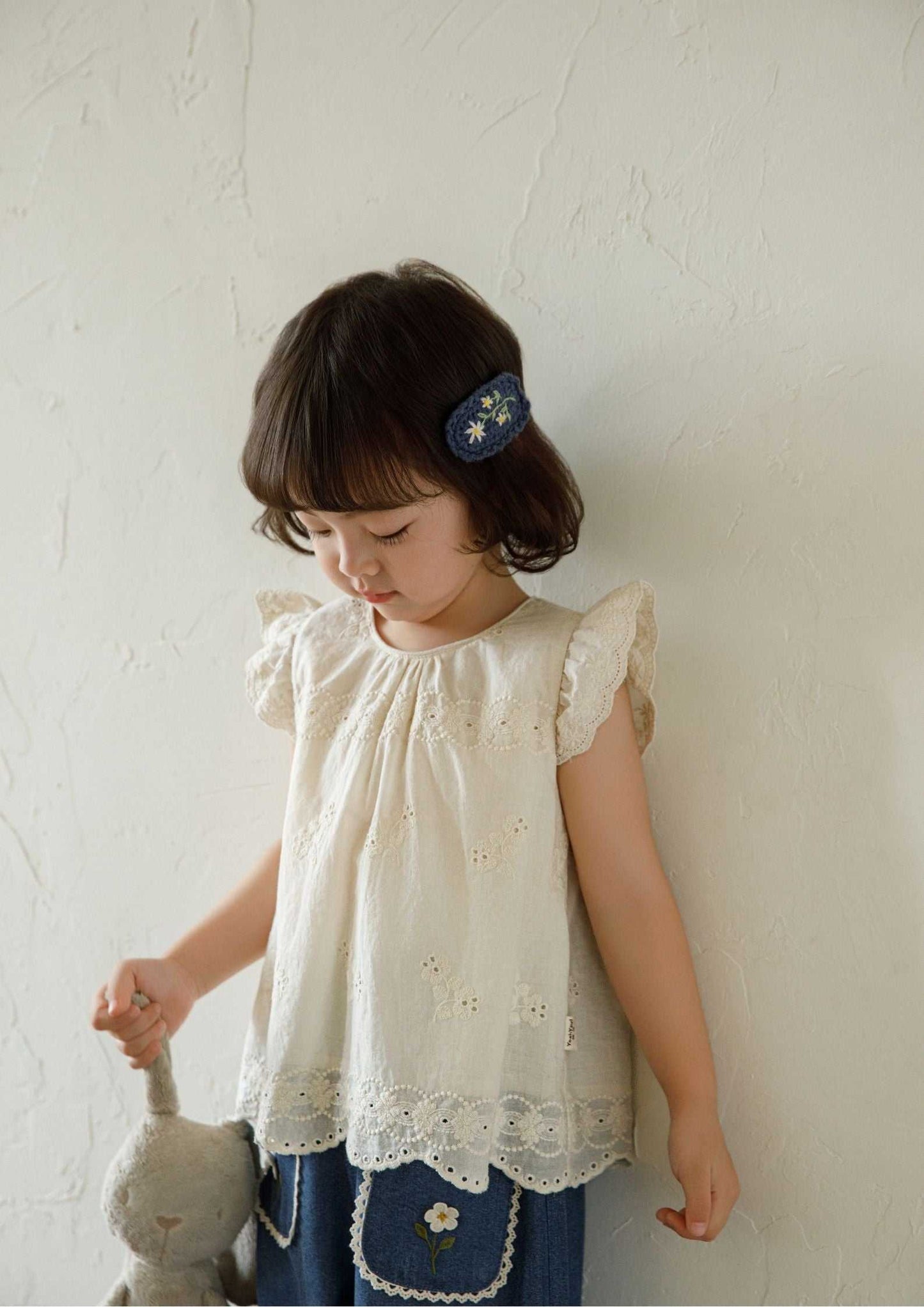 Girls embroidered cotton sleeveless beige floral blouse with ruffle sleeves and scalloped hem