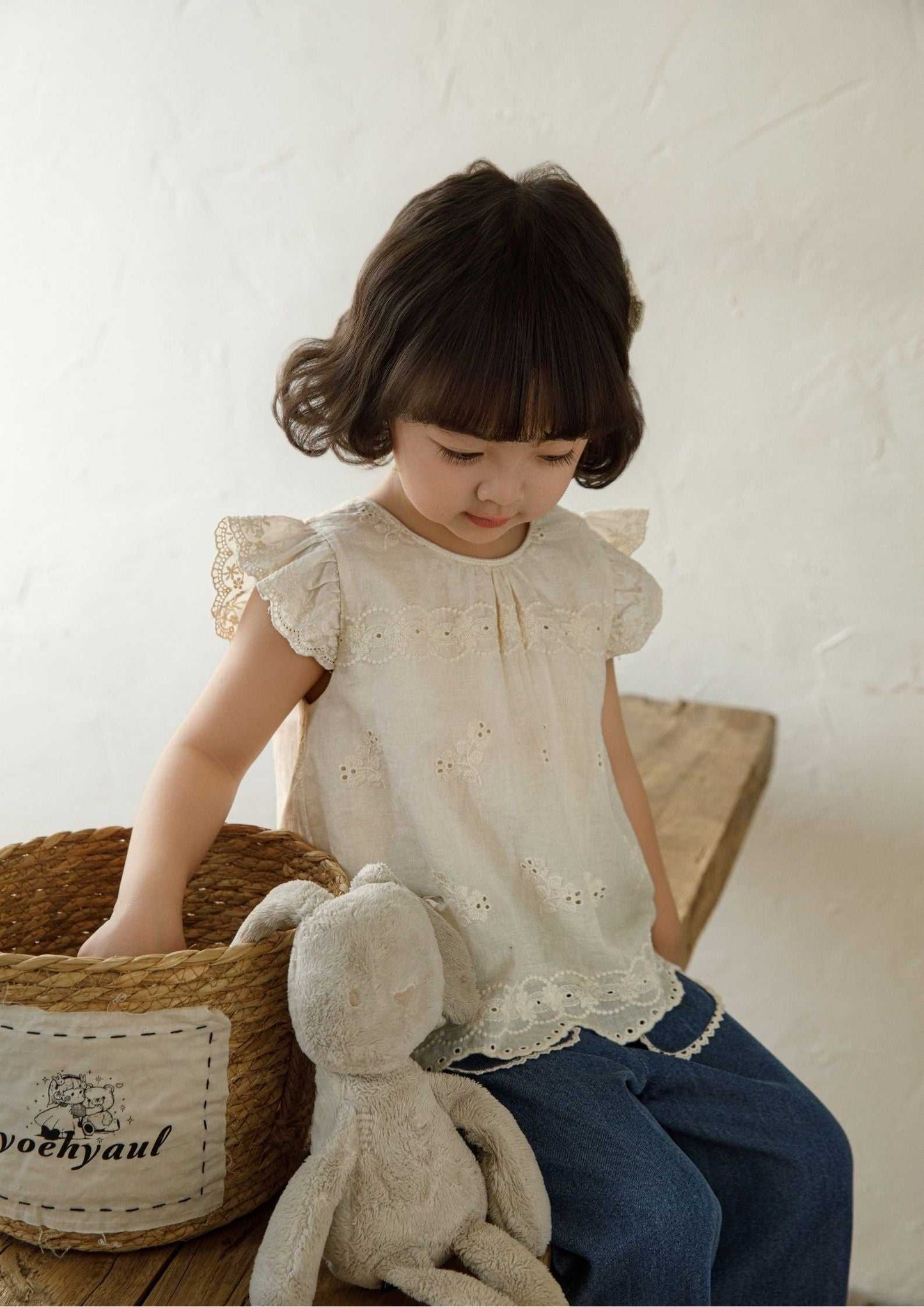 Girls embroidered cotton sleeveless beige floral blouse with ruffle sleeves and scalloped hem