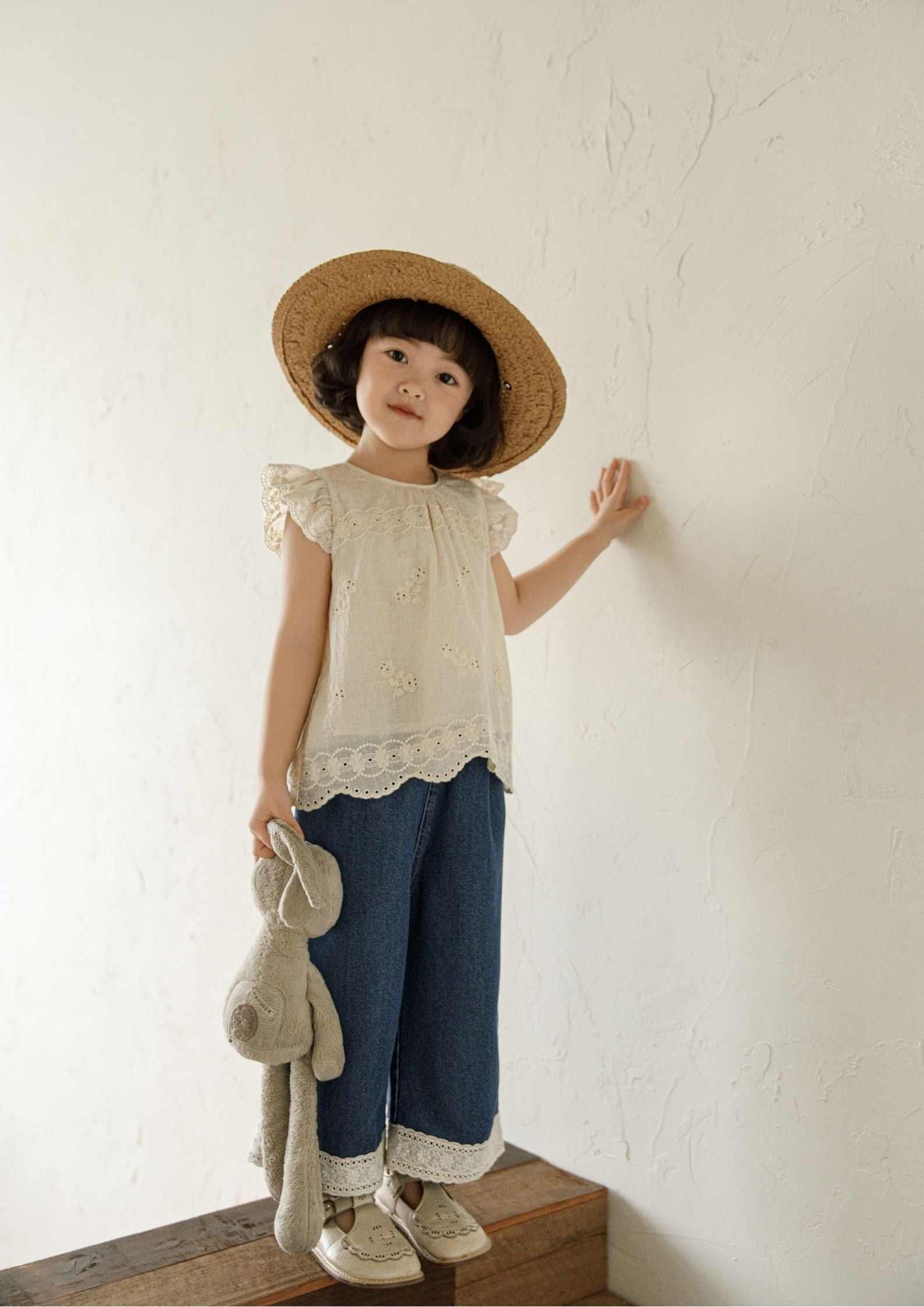 Girls embroidered cotton sleeveless beige floral blouse with ruffle sleeves and scalloped hem