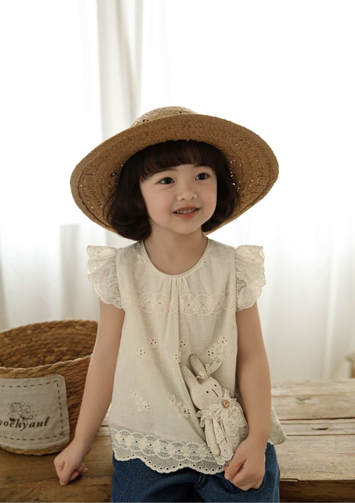 Girls embroidered cotton sleeveless beige floral top with ruffle sleeves and scalloped hem