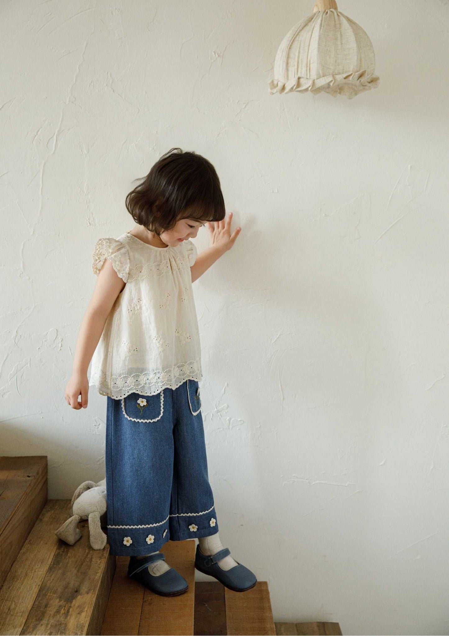 Girls embroidered cotton sleeveless beige floral blouse with ruffle sleeves and scalloped hem